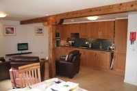 Kitchen area featuring original mill timbers - click to zoom